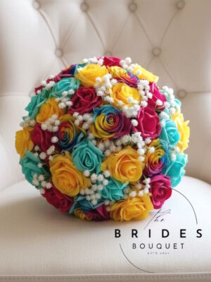 Rainbow wedding bouquet ready to ship with rainbow roses, colourful artificial flowers and white gypsophila
