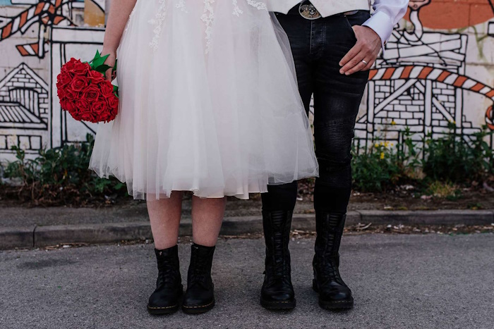 rock n roll bride feature image of the brides bouquet uk red artificial rose bridal bouquet