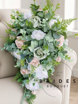 Cascading tear drop bridal bouquet with faux roses, eucalyptus and foliage in chosen colours
