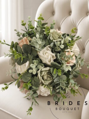 Bridal bouquet with faux roses, eucalyptus and foliage in chosen wedding colours